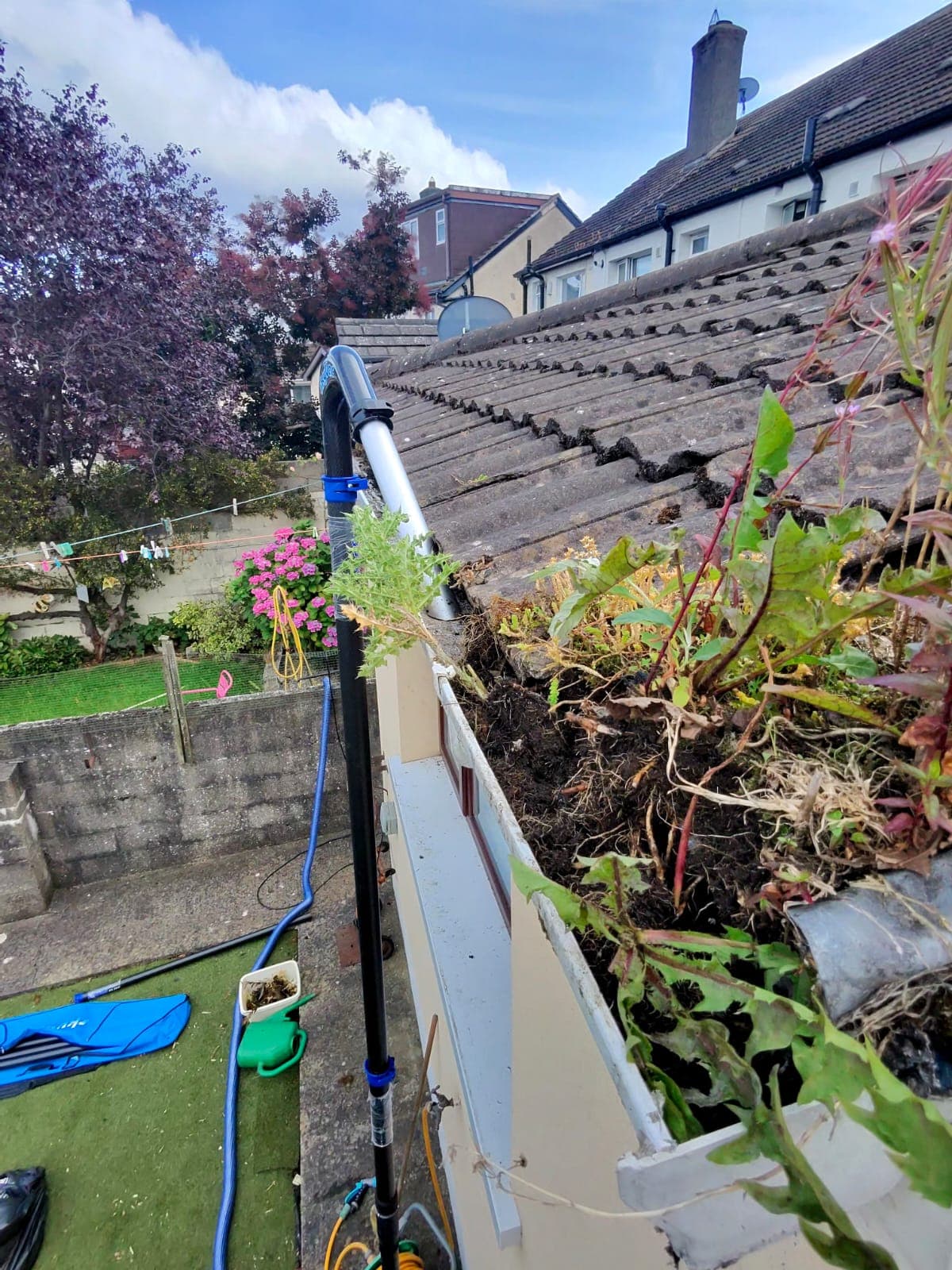 Gutter cleaning work in progress